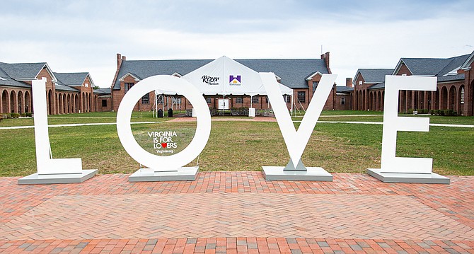 The LOVEworks sign, permanently located at the Workhouse Arts Center, has undergone an artistic transformation and will be unveiled Friday, Feb. 14, 2020 at 10 a.m.