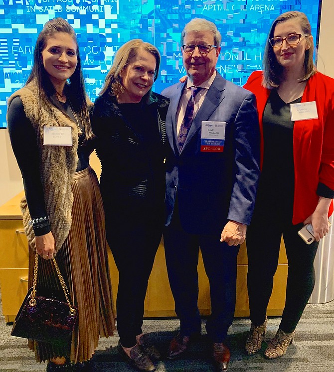 Newly installed Chamber of Commerce board chairman Dave Millard, second from right, celebrates at the Chairman’s Reception Jan. 30 at the National Industries for the Blind with his wife Mary Ann Best and daughters Jennifer Lopez and Amanda Millard.