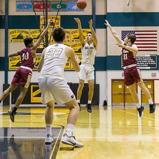 Noah Kim, who scored 10 points in Westfield loss to Oakton, gets shot off before Damien Brooks #10 and Chris Neary #11 can get to his shot.