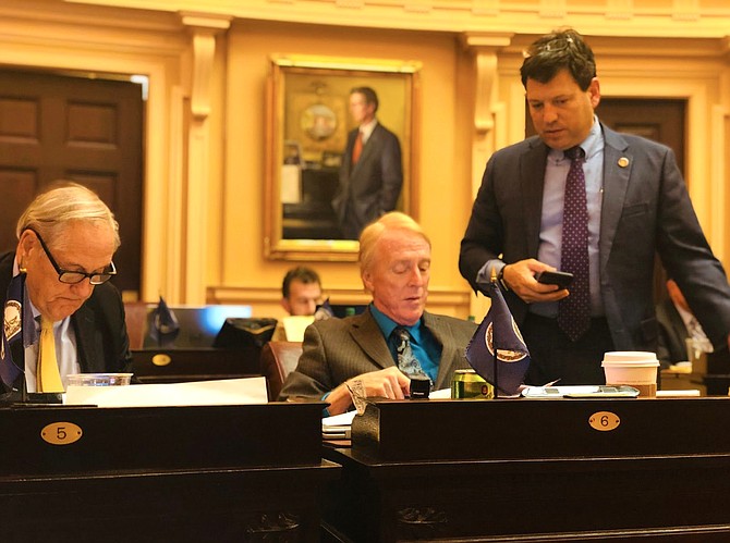 Sen. Scott Surovell (D-36), right, introduced an amendment on the Senate floor to take a regional approach to the minimum wage. That’s an idea originally proposed by Sen. David Marsden (D-37), whose vote Surovell was trying to get by introducing the amendment.