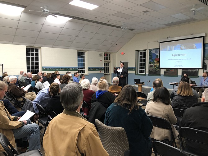 Supervisor Pat Herrity addresses the crowd at his Springfield District Town Hall Meeting on Feb. 19, 2020. He discussed his thoughts and concerns about the County’s proposals.