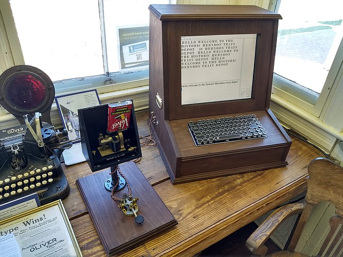 The new telegraph exhibit at the Herndon depot museum includes a telegraph key, sounder, and a computer through which messages are sent.