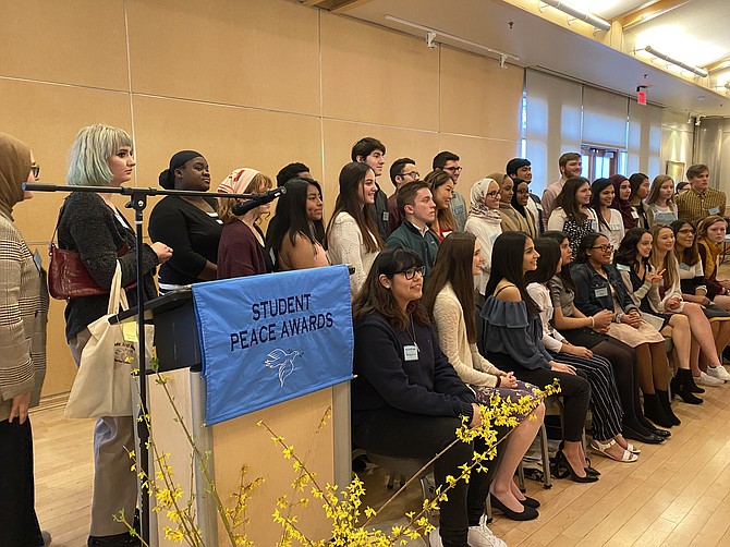 Family, friends and loved ones pack the community center at the 2020 Student Peace Awards of Fairfax County.