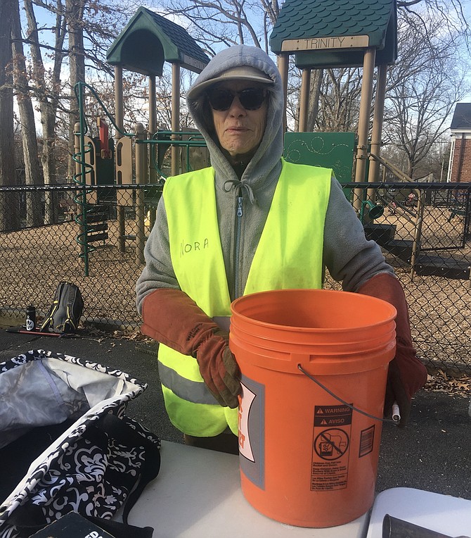 Nora Palmatier – who is present at almost every tree steward event – helped yank ivy, handed out vests and tools, encouraged the group, and applauded the idea of blowing a bugle when the tree is completed, a novel idea she might start using with all her ivy removal projects.