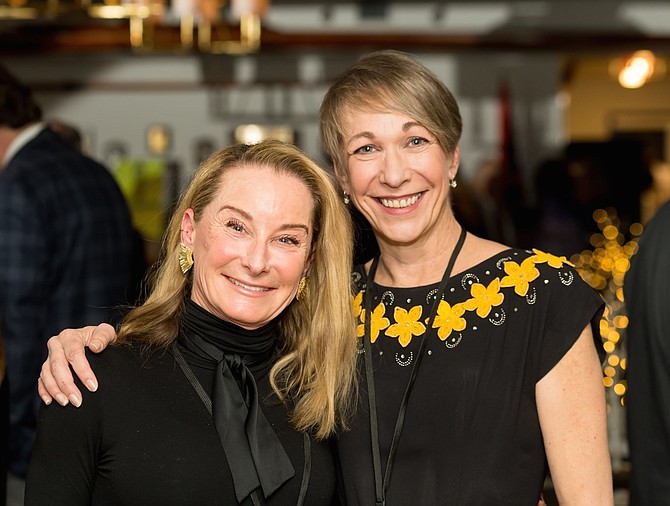 The Center for Alexandria’s Children honored RunningBrooke’s Founder and CEO Brooke Sydnor Curran, left, with its 2020 Champion of Children Award and Mary Hale, Inova Health System FACT Director, with its Outstanding Dedication to Children Award at its annual benefit Feb. 27 at the Old Dominion Boat Club.