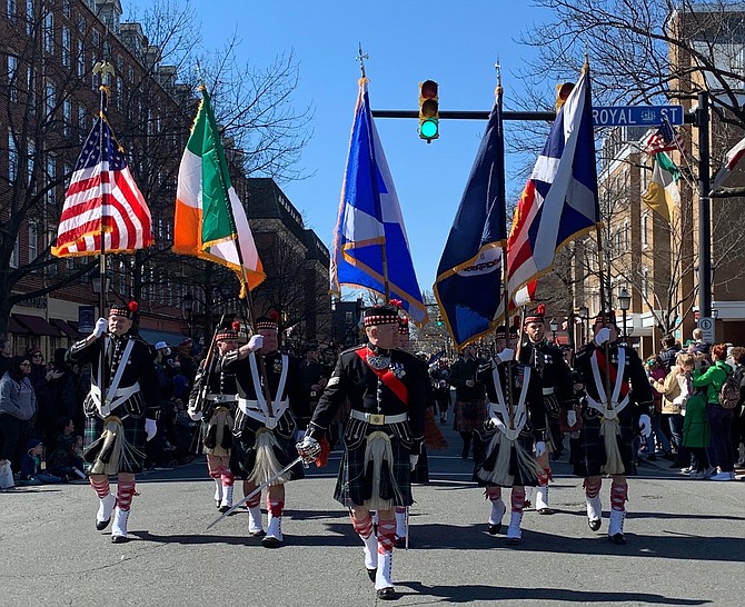 The St. Andrew's Society of Washington color guard walks past the reviewing stand during the March 7 St. Patrick’s Day Parade in Old Town.