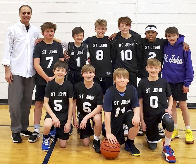 The sixth grade boys team from St. John Catholic Church in Mclean.