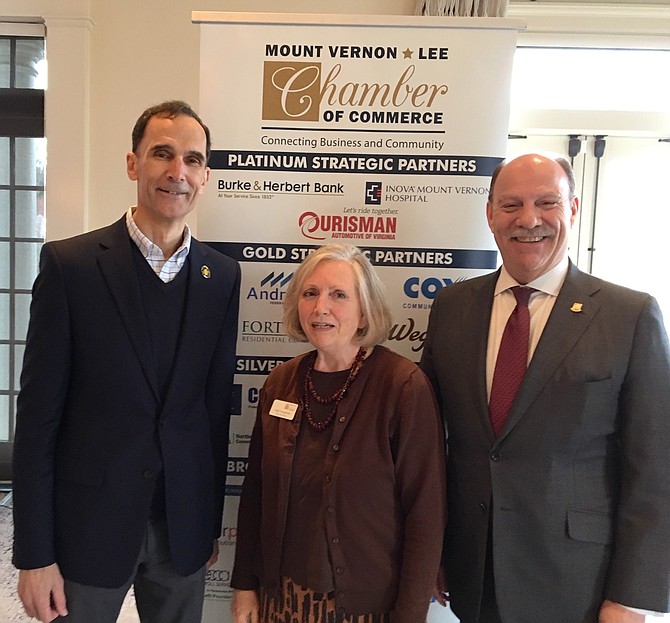 Holly Dougherty (center) Chamber Executive Director, welcomes Supervisor Dan Stork (left) and Barry Biggar, Visit Fairfax (right) to the Chamber's March Business Breakfast.