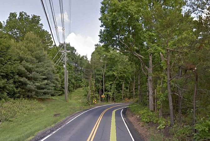 A view of the notorious Braddock Road S curve, on the east side, looking west.