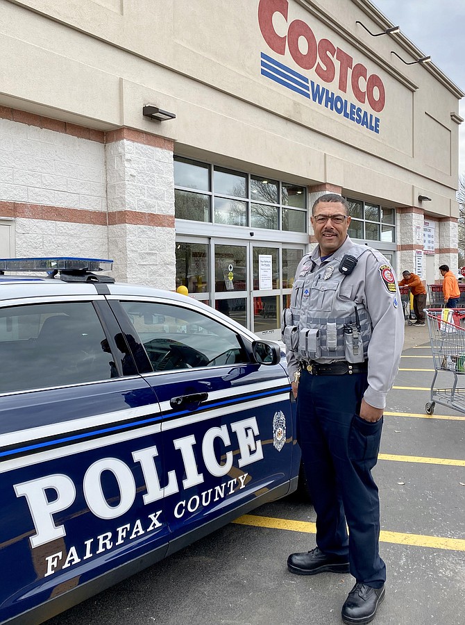 Police Officer R. Morton stationed at Costco as a crowd control precaution.