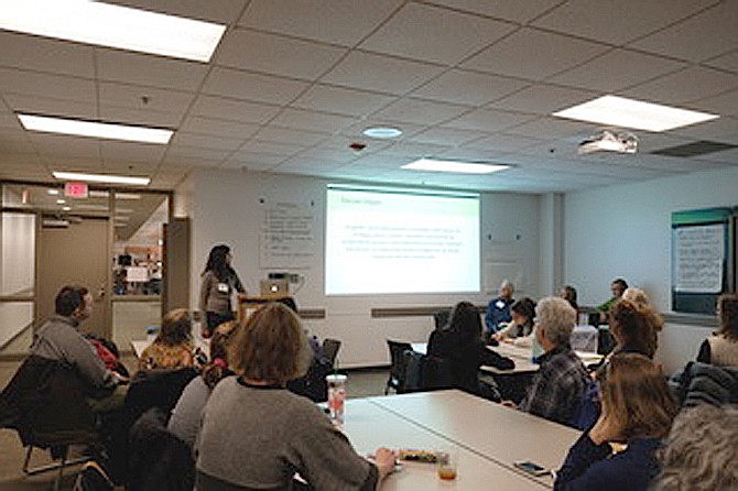 Mimi Shah addresses the group of parents, students, and residents at Central Library in November.