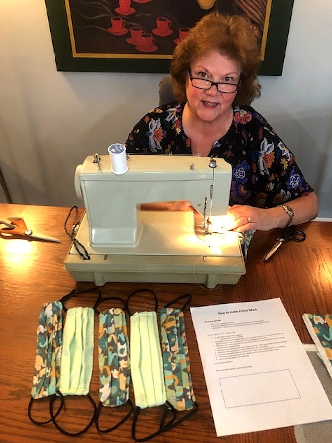 Kitty Bernard of Reston sewing CDC-compliant face masks.