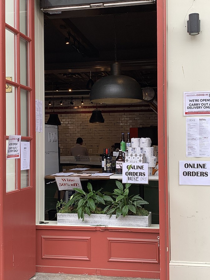 Mia’s on King Street has turned its front windows into pickup windows for restaurant takeout.