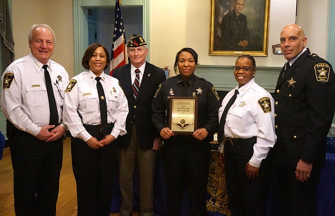 Alexandria Sheriff’s Office Deputy Ashley Battle, third from right, poses for a photo after being presented with the Law Enforcement Officer of the Year Award March 11 at the American Legion Post 24. Joining Battle are (l-r): Sheriff Dana Lawhorne, Captain Lynn Oliver, Post 24 Commander Henry Dorton, Chief Deputy Candra Callicott and Sergeant Gregory Perez.