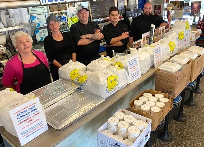 Ready with meals to go are (from left) 29 Diner managers Patti Staples and Michele St. Johns; executive chefs Jeremy Hand and Kevin Zust; and diner business partner, Kenneth Snaidman.