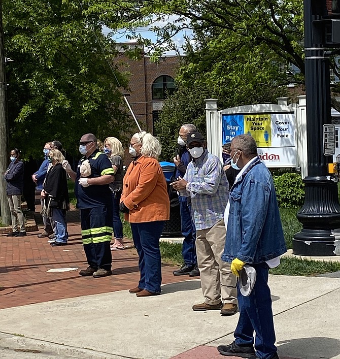 Individuals socially distance and say goodbye to their law enforcement hero, Darryl "Smitty" Smith, Sr. who served as Police Chief for the Town of Purcellville from 2006 to 2015 after retiring as Captain from the Herndon Police Department in 2004.