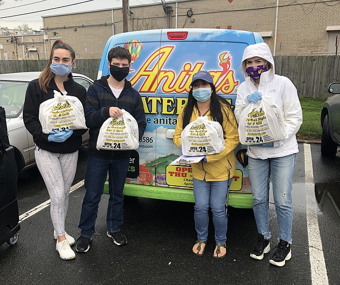 (From left) Picking up from Anita's in Herndon for Herndon Cares are volunteers Madison Austell, Josh Killian, Christine Mayuga, and Renee Austell.