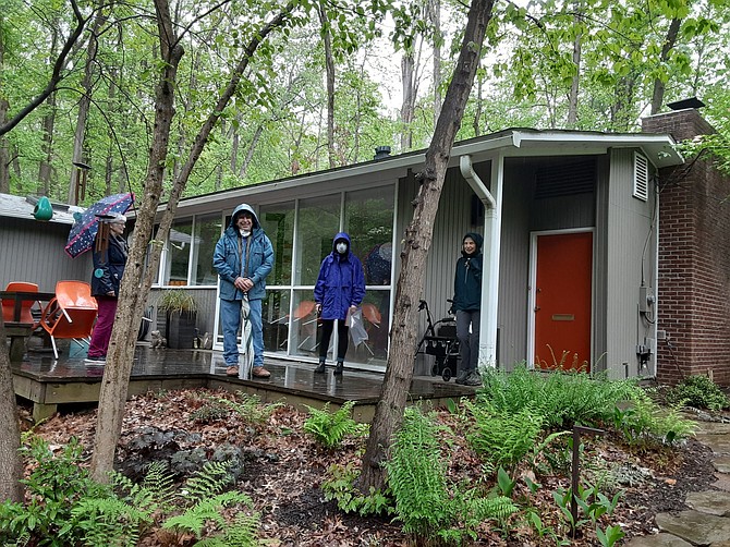 Some residents of Hollin Hills gathered to point out elements of the stream project that they think is not necessary in this wooded neighborhood.