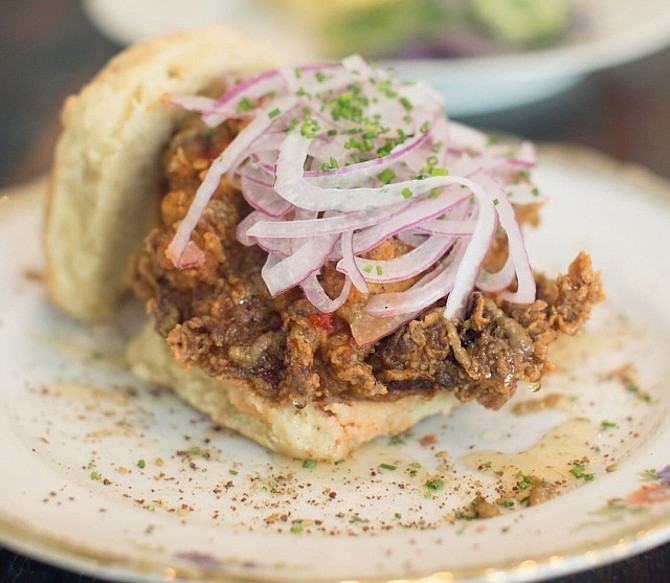 Stomping Ground has two fried chicken biscuit sandwiches, “Classic” and “Not So Classic.” The latter is pictured here.