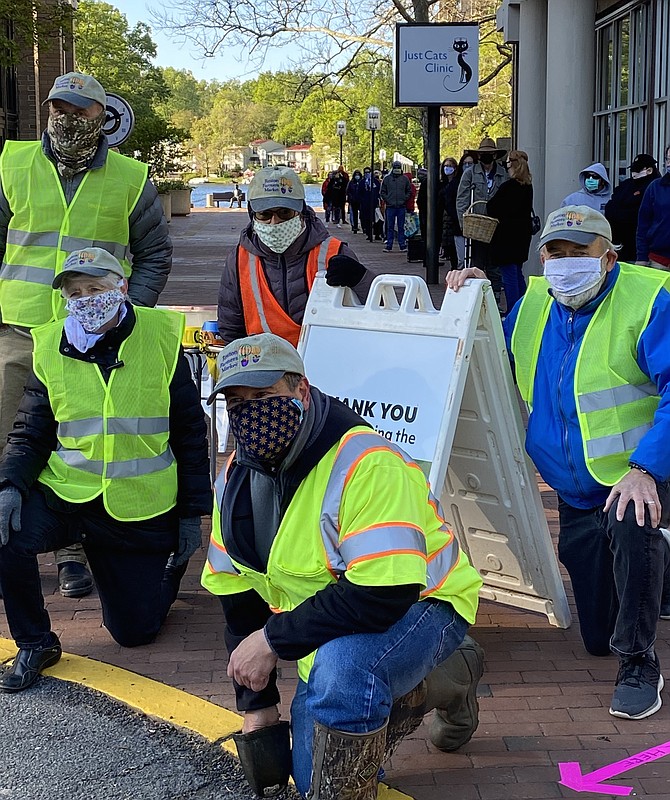 Opening Day for the 2020 Reston Farmers Market (From left) Brian Pittack, Lake Anne Volunteer, Fran Lovaas, Reston Farmers Market Co-Market Master, Linda Fuller, Lake Anne Florist (retired), John Dudzinsky, Herndon Market Manager and John Lovaas, Reston Farmers Market Co-market Manager.