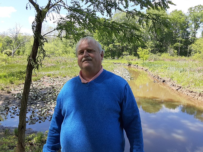 David Gahart has seen much trash float by in Little Hunting Creek.