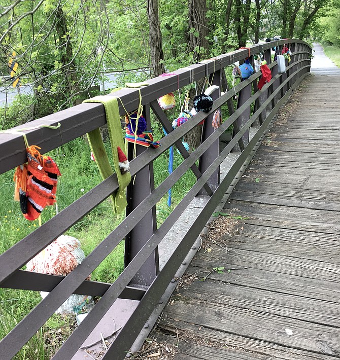 Everyone is invited to add decorations to the footbridge on River Road across from Falls Bridge Road. Many have responded.