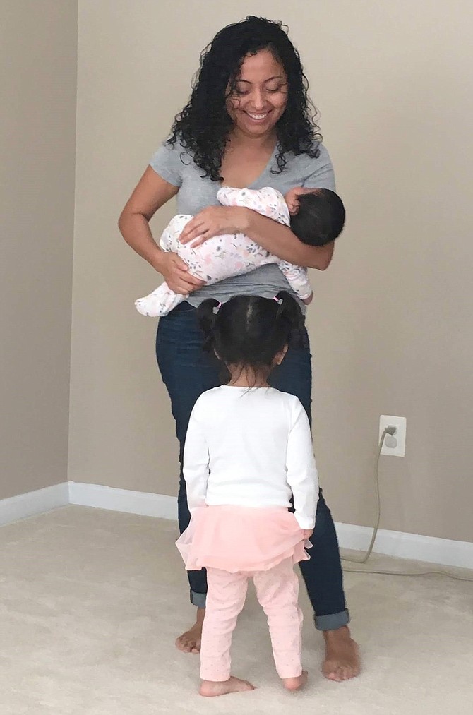 Claudia Morales, with two of her foster children.