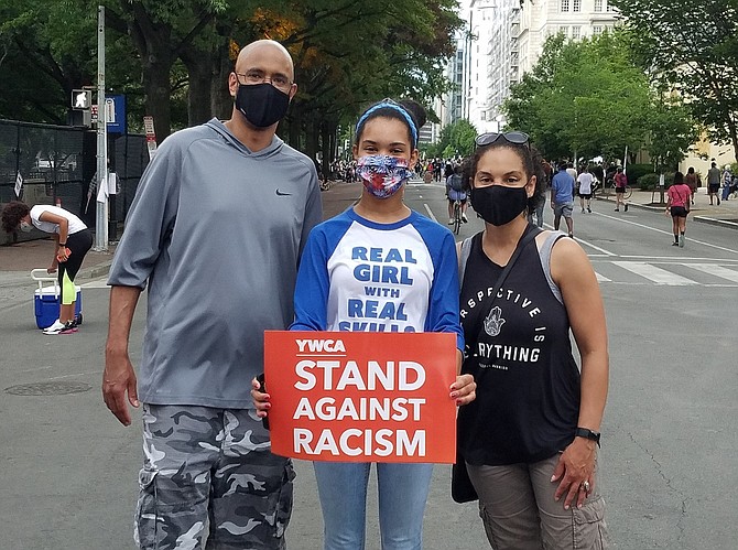 (From left) Centreville residents Erik, Kayla and Jamie Gadley about to join a peaceful protest, last Friday, in Washington, D.C.