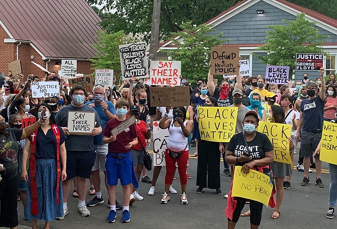 Protesters gather in front of the Charles Houston Recreation Center June 4 to participate in a rally in memory of George Floyd, who died while in police custody May 25 in Minneapolis.