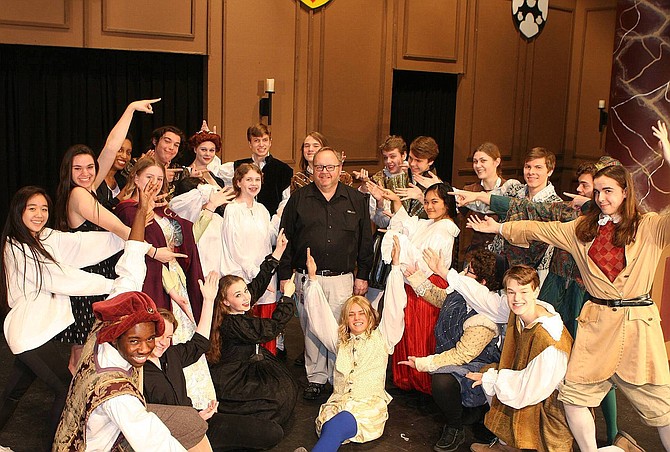 Centreville High Theater Director Mike Hudson (center) and the cast of 2017’s “Twelfth Night.”