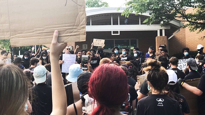 Protesters gathered at the West Springfield Governmental Center as Jackson Morrow spoke and led a prayer.