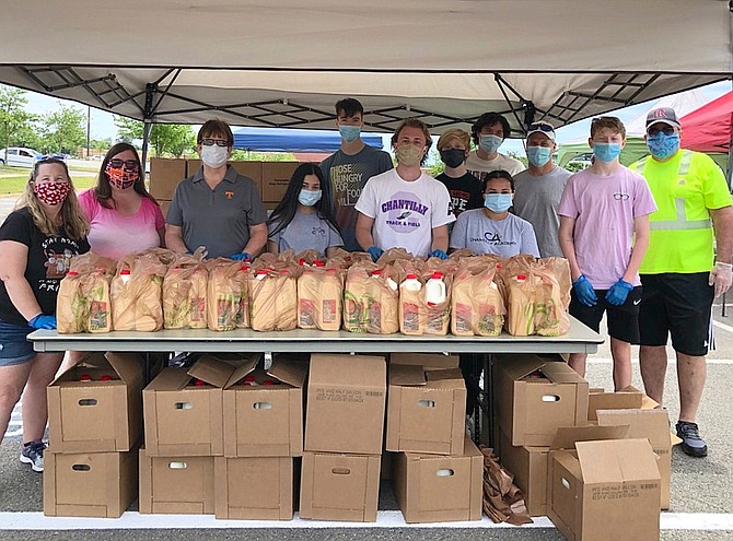 Ox Hill Baptist Church members ready to distribute milk and dairy products.