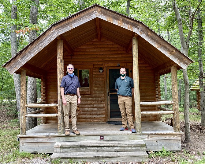 Paul Gilbert and Brad Jackson outside Pohick Bay Park “Rustic” cabin.