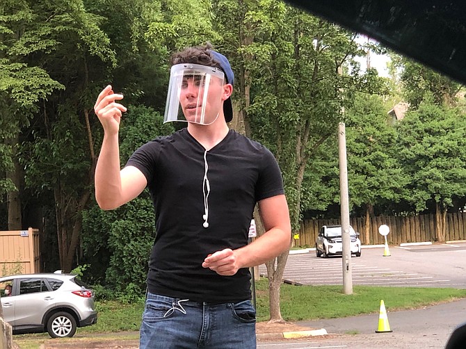 Benjamin Cudmore, of Vienna, a flex actor, steps in to act as The Cynic for the audience in the Drive-Thru Drama by the Alden Theatre.