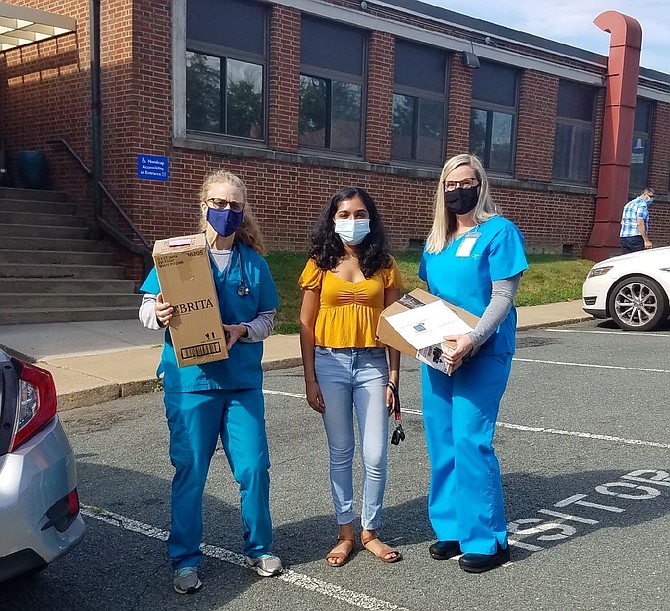 Rachana Subbanna, a junior at the University of Virginia, dropping off 25 devices this week at the Charlottesville Free Clinic.