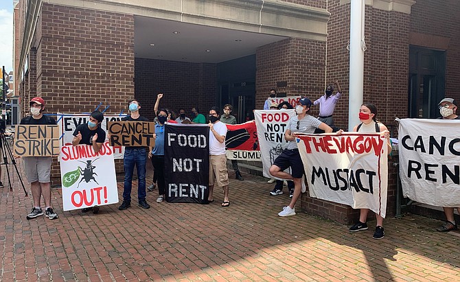 Residents of Southern Towers protest during eviction hearings July 15 outside the Franklin P. Backus Courthouse in Old Town. Organized by residents and the Metro D.C. Democratic Socialists of America, the protest called for the cancellation of rent payments.