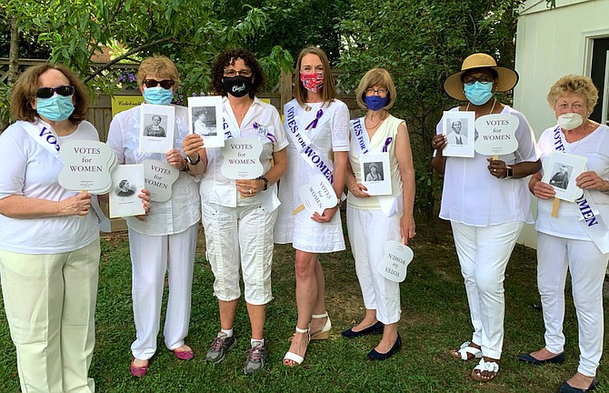 Republican women with photos of the suffragists they profiled at the CRWC celebration with special guest Wendy Gade (center), wife of Republican nominee for U.S. Senate Daniel Gade.