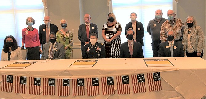 Front Row, Tanya Bradsher, chief of staff to Congressman Don Beyer; Supervisor Rodney Lusk, Lee District; Col. Michael Greenberg, Fort Belvoir; Supervisor Dan Storck, Mount Vernon District; Stanley Koussis, chairman, Mount Vernon Lee Chamber. Back Row: Alison Ross Tompkins, The Fairfax; Dan Rinzel, Redmon, Peyton & Braswell LLP; Katherine Ward, Mount Vernon Council of Citizen Associations; Peter Sitnik, SITCO Inc.; Cindy Hurrle, Mount Vernon Country Club; Casey Whitmarsh, South Fairfax Chamber; Mark Murray, Fort Belvoir Swim Team; Joel Bernstein, ECCA Payroll; Holly Dougherty, Mount Vernon Lee Chamber.