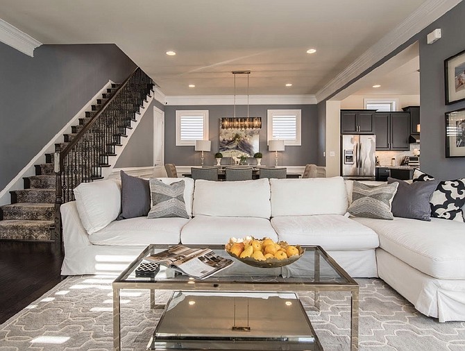 This free-flowing living room and dining room was designed by Quintece Hill-Mattauszek of Studio Q Designs in Alexandria.