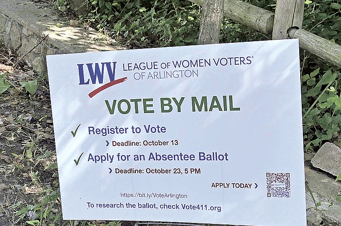 A poster widely distributed across Arlington urging voters to vote absentee in the upcoming November 3 election.