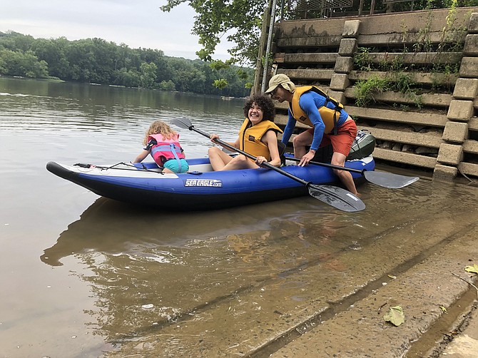 Tom and Anita Breach, along with their daughter Flora, push off from Riverbend’s boat ramp, ready to enjoy a cool day on the river.