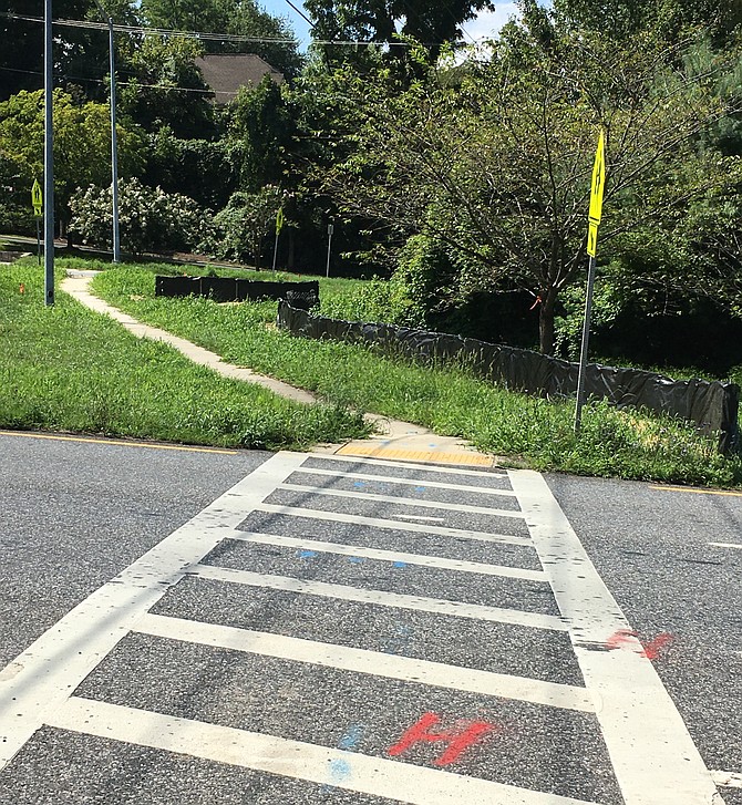 Walkway across River Road at Pyle Road will be wider and have pedestrian-operated traffic lights for safety when the Maryland DOT State Highway Administration safety improvement project Is complete.