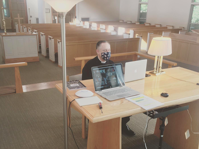 Father David Lucey preaching to a virtual audience from the altar at St. Francis on Sunday, July
12. The staff at St. Francis has been holding remote services since mid-March, with help from their "tech/communications" assistant Patrick Killoran.