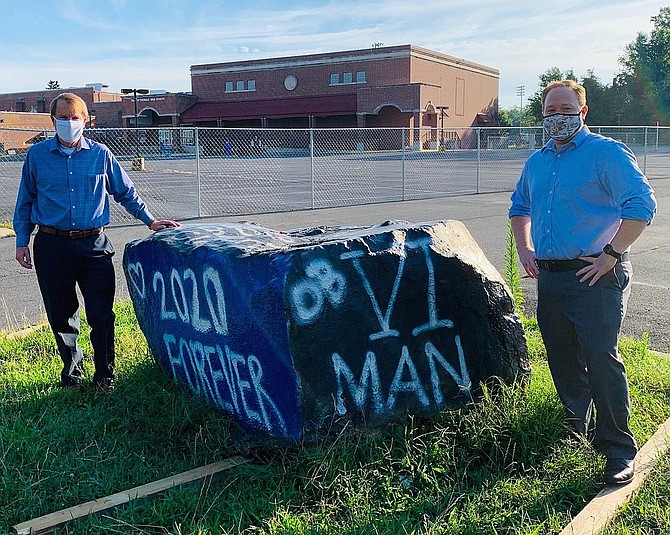 (From left) Fairfax City Mayor David Meyer and Economic Development Director Chris Bruno were on hand when Paul VI’s spirit rock was moved from the City.