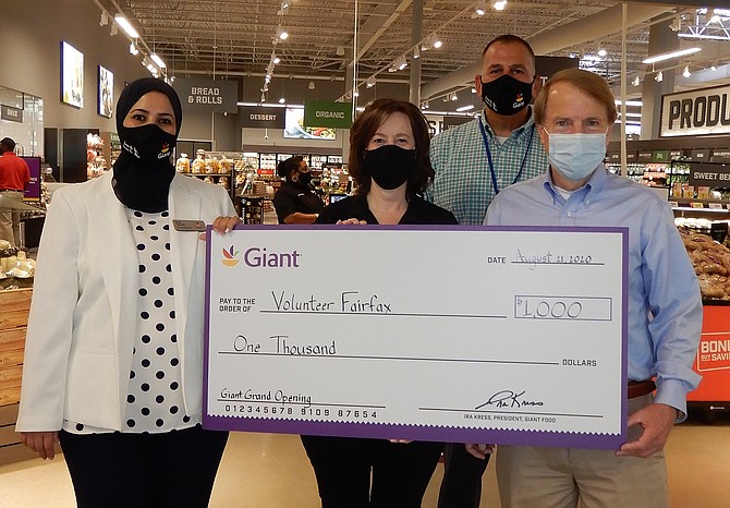 (From left) are Giant Store Manager Ilham Tarbouz, Volunteer Fairfax’s Marianne Alicona, Giant District Manager Jeff Lewis and Mayor David Meyer.