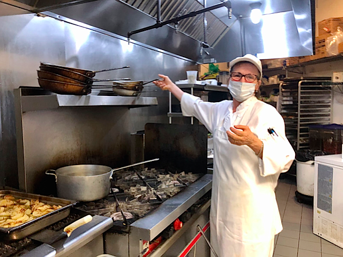 Executive chef and “Our Mom” Eugenia Hobson continues to oversee the restaurant’s operations in the kitchen during the pandemic.