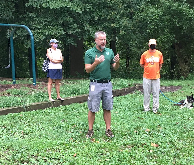 Bob Trumbull, manager of Montgomery Parks natural surface trail construction, addresses Cabin John residents concerned about changes in the Cabin John Stream Valley Park most used frequently.