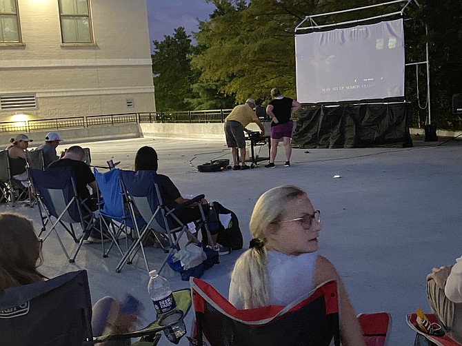 Woodland Park Crossing hosts "Movies Under the Stars," a series of Friday evening family-friendly films.