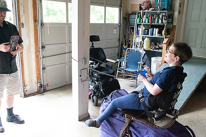 Turning possible into possibilities: Rachael Wessel on her hay horse in her garage.