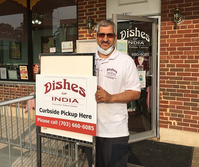 Naresh Bhatt welcomes guests to Dishes of India in Belle View. This family owned and operated restaurant is open currently for carry-out only.